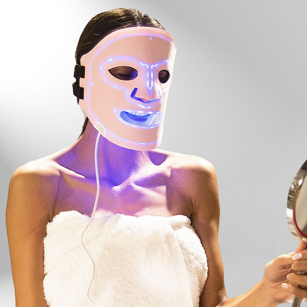Aura LED Mask demonstrating light therapy on skin