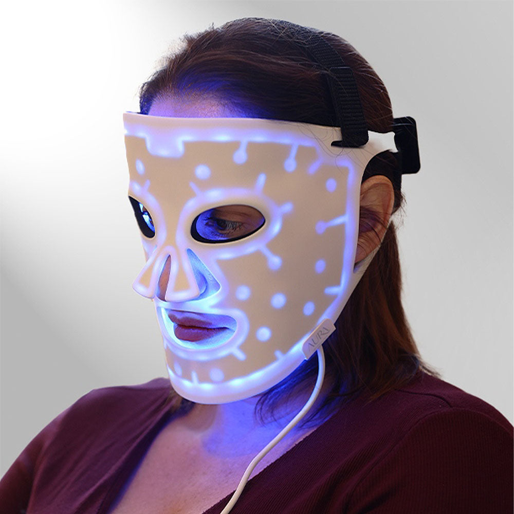 Woman wearing Aura Plus Near-infrared LED Light Therapy Mask